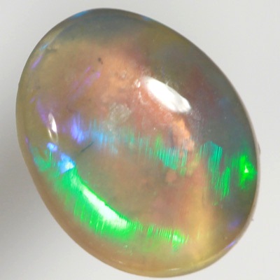 SOLID CRYSTAL OPAL Bright rollling flashes of green and turquoise